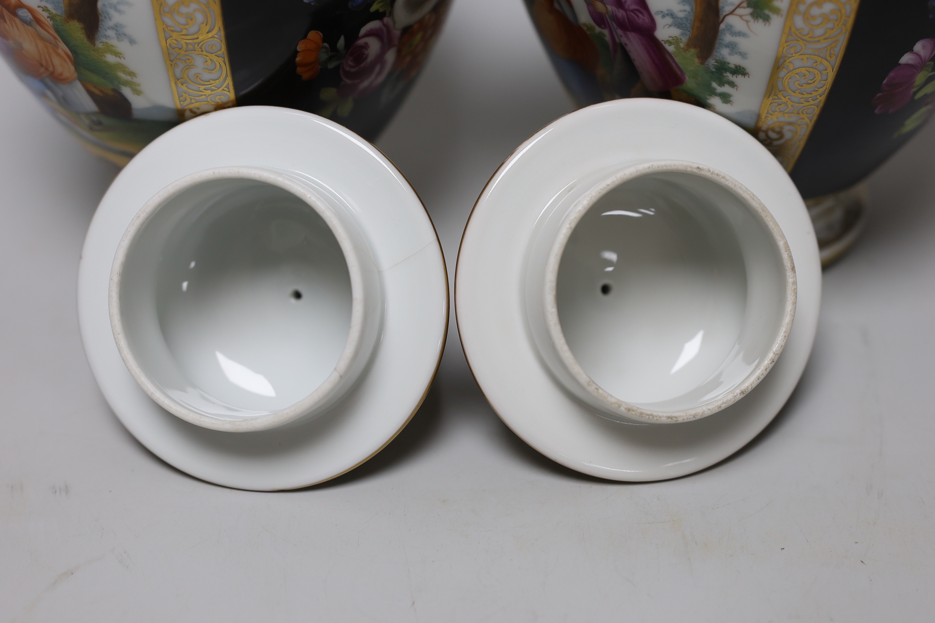 A pair of Dresden vases and covers and two Doulton figures, tallest 26cm